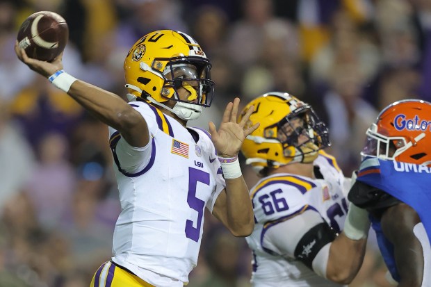 LSU quarterback Jayden Daniels accounted for 5 touchdowns during the Tigers' 52-35 win Nov. 11 at Tiger Stadium in Baton Rouge. (Photo by Jonathan Bachman/Getty Images)