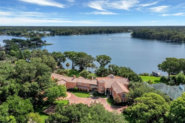 The 25,000-square-foot mansion was the home of the late Charles W. and Joan B. Clayton. It had eight bedrooms, 9 full baths and 5 half baths, multiple kitchens, three elevators and two garages for seven vehicles. (Photo courtesy of Re/Max 200 Realty)