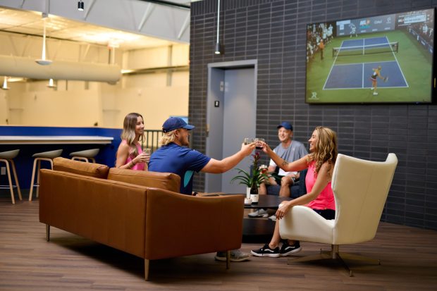 A players lounge on the mezzanine level overlooks the indoor pickleball courts. (Courtesy of The Pickleball Club)