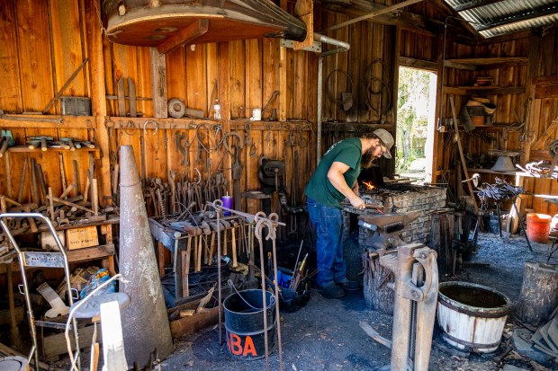 Blacksmithing is demonstrated during the 47th annual Fall Country Jamboree at the Barberville Pioneer Settlement in Volusia County on Nov. 5, 2023. (Patrick Connolly/Orlando Sentinel)