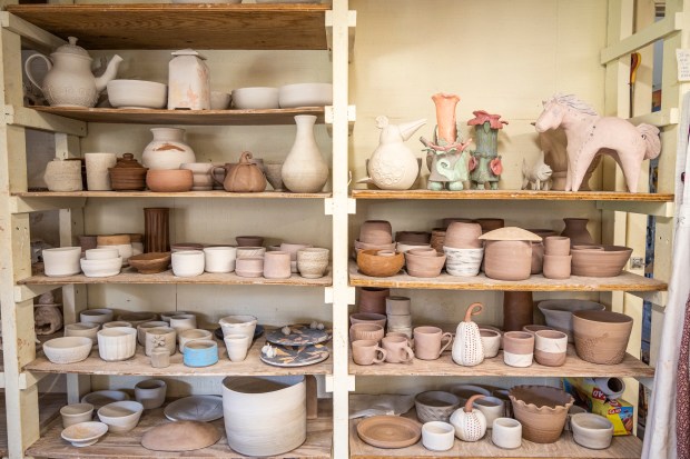 Shelves are lined with pottery and ceramics at Crealdé School of Art in Winter Park on Sept. 21, 2023. (Patrick Connolly/Orlando Sentinel)