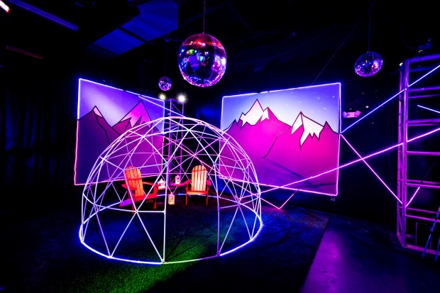 Earth Illuminated is a new immersive art experience on International Drive with scenes including a starry night over the mountains on Sept. 27, 2023. (Patrick Connolly/Orlando Sentinel)