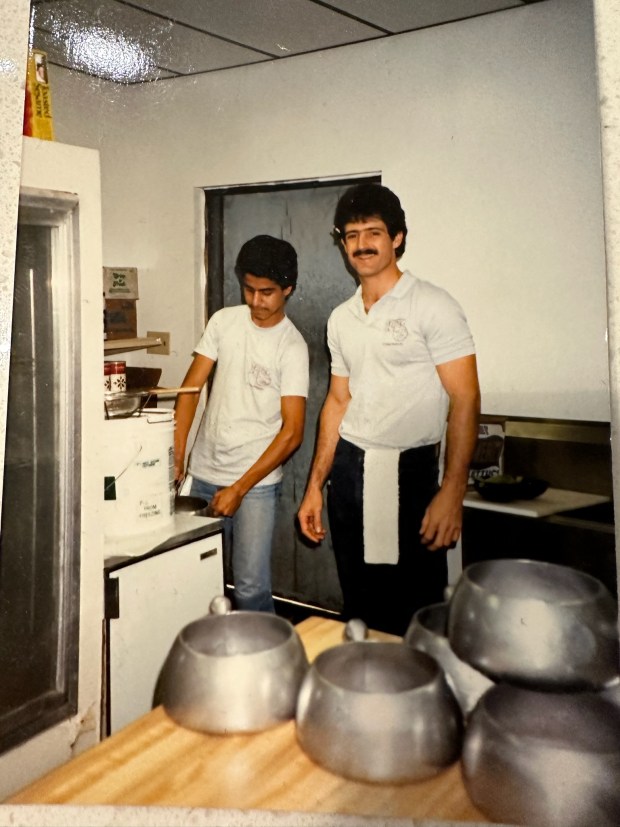 Decades of cheese: Robert Frady, co-owner of the The Melting Pot in Longwood, back in 1986, when he began his tenure with the franchise as a server in Tallahassee. (Courtesy Robert Frady)