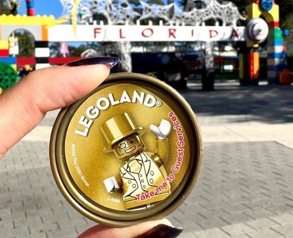 Mr. Gold pop badges are available for the asking at Legoland Florida theme park. (Legoland Florida)