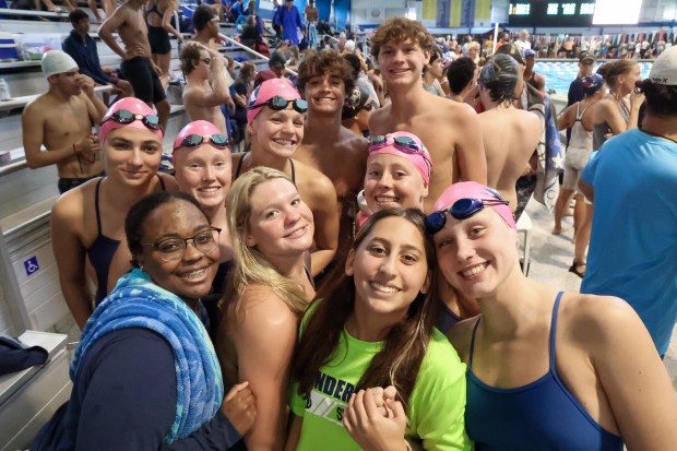 Members of the Windermere High swim team during a meet at the Rosen Aquatics and Fitness Center in Orlando on Thursday, October 26, 2023. (Rich Pope, Orlando Sentinel)